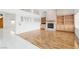 Bright living room with wood flooring, fireplace, and custom built-in shelving at 3032 Bonnie Rock Dr, Las Vegas, NV 89134
