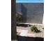 Landscaped backyard featuring desert plants and a block wall at 3401 Conan St # 103, Las Vegas, NV 89129