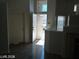 Entrance foyer with tile flooring and an open view to the living spaces at 3401 Conan St # 103, Las Vegas, NV 89129