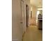 Hallway view leading to an open kitchen with a pantry and view to the living room at 3401 Conan St # 103, Las Vegas, NV 89129