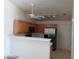 Bright kitchen with stainless steel appliances and light wood cabinets offers modern convenience at 3401 Conan St # 103, Las Vegas, NV 89129