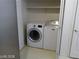 Laundry area with washer and dryer, and storage shelf above at 3401 Conan St # 103, Las Vegas, NV 89129