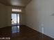 Bright living room featuring tiled floors and sliding glass doors at 3401 Conan St # 103, Las Vegas, NV 89129
