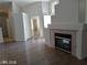 Bright living room featuring a fireplace and tile flooring at 3401 Conan St # 103, Las Vegas, NV 89129