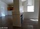 Open-concept layout connecting the living area and kitchen at 3401 Conan St # 103, Las Vegas, NV 89129