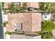 Bird's eye view of a home showcasing the tile roof, backyard pool with a fire pit and garden at 35 Glade Water Dr, Henderson, NV 89052