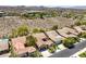 An aerial view showcasing the community layout and stunning mountain backdrop at 35 Glade Water Dr, Henderson, NV 89052