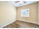This lovely neutral bedroom offers great natural light and wood-look tiling at 35 Glade Water Dr, Henderson, NV 89052