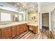 Large vanity with a lot of countertop space, double sinks, and many drawers for storage at 35 Glade Water Dr, Henderson, NV 89052