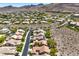 An elevated shot of a dense residential area, complete with winding roads and landscaped yards at 35 Glade Water Dr, Henderson, NV 89052
