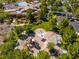 Aerial view of the community playground with slides, swings, and climbing structures, surrounded by greenery at 35 Glade Water Dr, Henderson, NV 89052