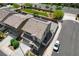 A clean aerial view of a two-story home with a tile roof and solar panels next to an adjacent two-story home at 351 Nativo Ave, North Las Vegas, NV 89031