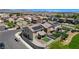Well-maintained backyard featuring a patio, manicured lawn, and privacy fence at 351 Nativo Ave, North Las Vegas, NV 89031