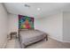 Cozy bedroom with simple decor, neutral carpet, and natural light from a window at 351 Nativo Ave, North Las Vegas, NV 89031