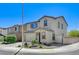 Inviting two-story home featuring desert landscaping, a two-car garage, and a walkway to the entrance at 351 Nativo Ave, North Las Vegas, NV 89031