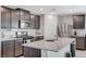 Contemporary kitchen with granite countertops, stainless steel appliances, and abundant cabinet space at 351 Nativo Ave, North Las Vegas, NV 89031
