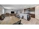Open concept living space with kitchen, dining area and living room with modern finishes at 351 Nativo Ave, North Las Vegas, NV 89031