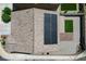 Aerial view of house roof with solar panels and backyard with lawn and gravel at 351 Nativo Ave, North Las Vegas, NV 89031