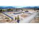 Aerial view of a home on a large lot, showcasing the expansive yard space and peaceful surroundings at 3611 W Horn Rd, Pahrump, NV 89048