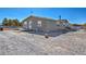 Expansive backyard area, perfect for outdoor activities and entertaining, with desert landscaping at 3611 W Horn Rd, Pahrump, NV 89048
