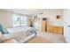 A cozy bedroom featuring natural light and comfortable design at 3611 W Horn Rd, Pahrump, NV 89048