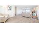 Inviting living room with bright natural light, wood burning fireplace, and comfortable seating at 3611 W Horn Rd, Pahrump, NV 89048