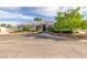 Stunning single-story home with a well-maintained landscape and a charming tile roof, offering curb appeal at 3684 Mooncrest Cir, Las Vegas, NV 89129