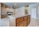Open kitchen view with center island, a fireplace and recessed lighting at 3684 Mooncrest Cir, Las Vegas, NV 89129