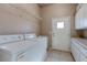 Functional laundry room with washer, dryer, sink, and storage cabinets at 3684 Mooncrest Cir, Las Vegas, NV 89129