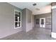 Spacious covered patio with direct access to the house provides a versatile outdoor living space at 3684 Mooncrest Cir, Las Vegas, NV 89129