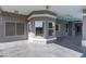 Covered patio area with multiple access points provides a seamless indoor-outdoor living experience at 3684 Mooncrest Cir, Las Vegas, NV 89129
