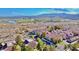 Stunning aerial view of the Laughlin Bay Village community, set against a backdrop of mountains and a winding river at 3740 Desert Marina Dr # 12, Laughlin, NV 89029