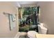 Well lit bathroom with decorative shower curtain and lots of space at 3740 Desert Marina Dr # 12, Laughlin, NV 89029