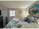 Bedroom featuring a queen bed with turtle themed bedding and window at 3740 Desert Marina Dr # 12, Laughlin, NV 89029