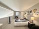 Upstairs loft bedroom decorated with a guitar theme and cozy decor at 3740 Desert Marina Dr # 12, Laughlin, NV 89029
