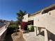 Inviting condo exterior with a well-manicured lawn and shrubs; stairway leads to the entrance at 3740 Desert Marina Dr # 12, Laughlin, NV 89029