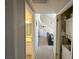 Hallway showing the bathroom, stairs to the second story, and laundry area at 3740 Desert Marina Dr # 12, Laughlin, NV 89029