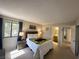 Bright main bedroom featuring ensuite bathroom, lots of storage and comfortable bed at 3740 Desert Marina Dr # 12, Laughlin, NV 89029
