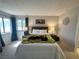 Bright main bedroom featuring mountain views, cozy decor and comfortable bed at 3740 Desert Marina Dr # 12, Laughlin, NV 89029