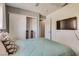 Inviting bedroom with a TV and closet for ample storage at 3886 Green Leaf Dr, Las Vegas, NV 89120