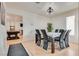 Dining area with contemporary table and chairs adjacent to the game room, creating a versatile space at 3886 Green Leaf Dr, Las Vegas, NV 89120