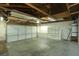 The large garage offers ample room for storage and has a work bench and built-in shelving at 3886 Green Leaf Dr, Las Vegas, NV 89120