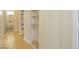 Hallway leading to rooms with built-in shelving at 3886 Green Leaf Dr, Las Vegas, NV 89120
