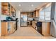 Well-lit kitchen with stainless steel appliances and light wood cabinetry at 3886 Green Leaf Dr, Las Vegas, NV 89120