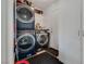 Laundry room with washer, dryer, and storage cabinets at 3886 Green Leaf Dr, Las Vegas, NV 89120