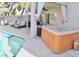 Backyard pool, hot tub, and lounge area for relaxing and entertaining in the desert sun at 3886 Green Leaf Dr, Las Vegas, NV 89120