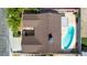 Birds-eye view of the home with a large pool, covered patio, and well-maintained roof at 3905 Cherokee Ave, Las Vegas, NV 89121