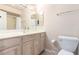 Bathroom featuring a vanity, mirror, and toilet at 3905 Cherokee Ave, Las Vegas, NV 89121
