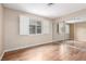 Bedroom featuring laminate floors, and a mirrored closet at 3905 Cherokee Ave, Las Vegas, NV 89121