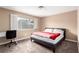 Cozy bedroom with a comfortable bed, study desk, and large window offering natural light at 3905 Cherokee Ave, Las Vegas, NV 89121